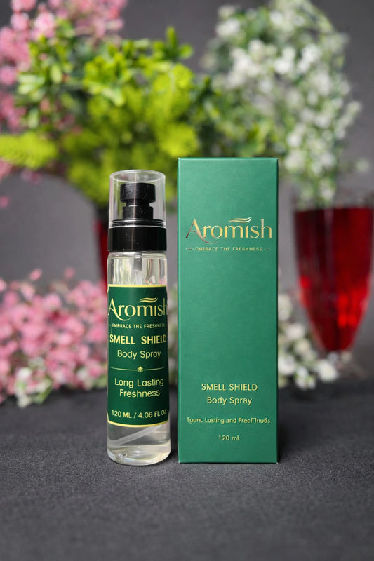 “Aromish Smell Shield body spray with floral fragrance packaging on dark background”